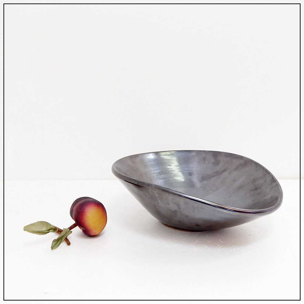 Decorative dishes or vintage ceramic grey glazed catchalls.