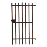 Old riveted wrought iron gate cellar door