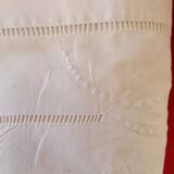 White sheet: reverse with embroidery and handmade stitching.