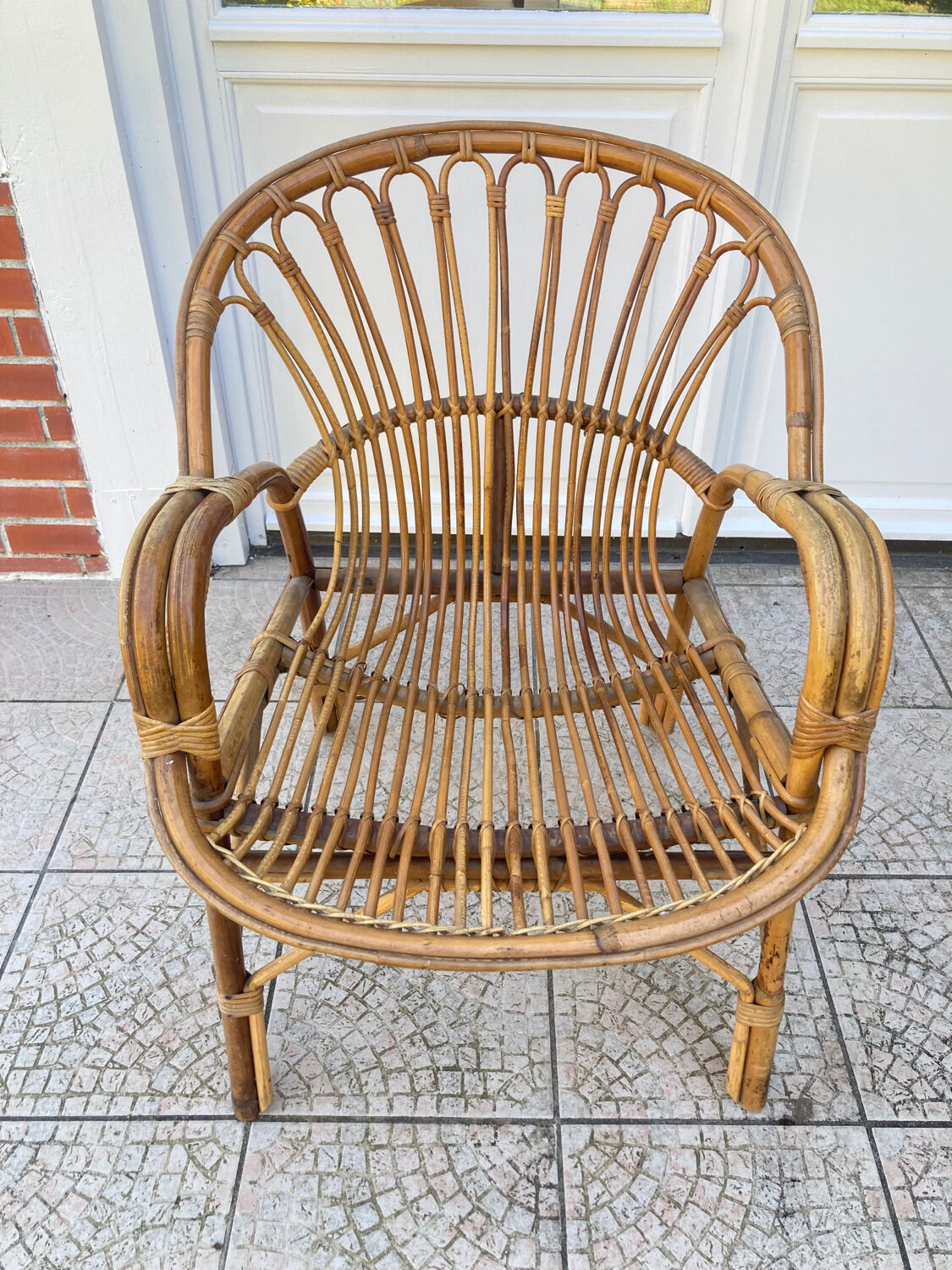 Vintage shell rattan armchair