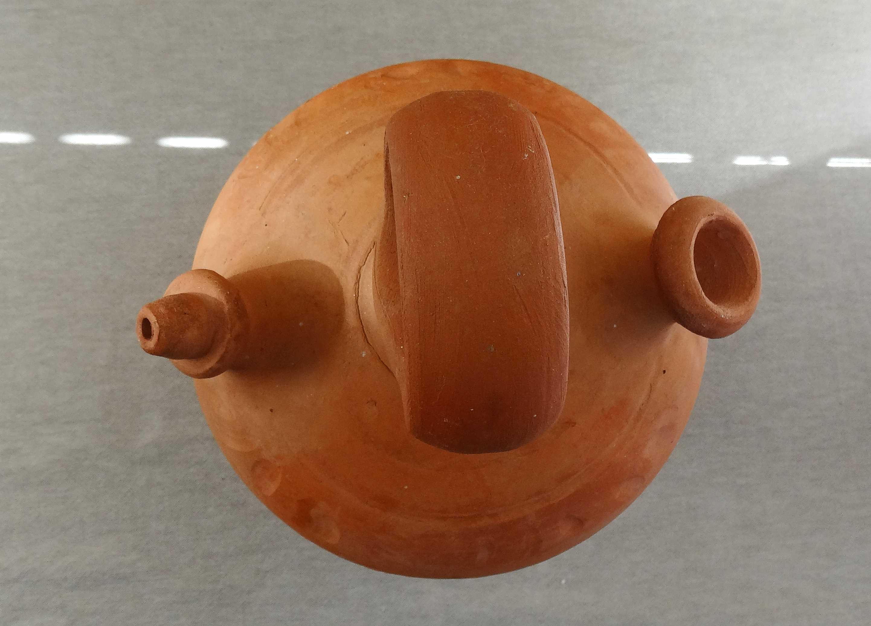 Gargoyle / terracotta water jug