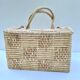 Valise vintage en fibres naturelles