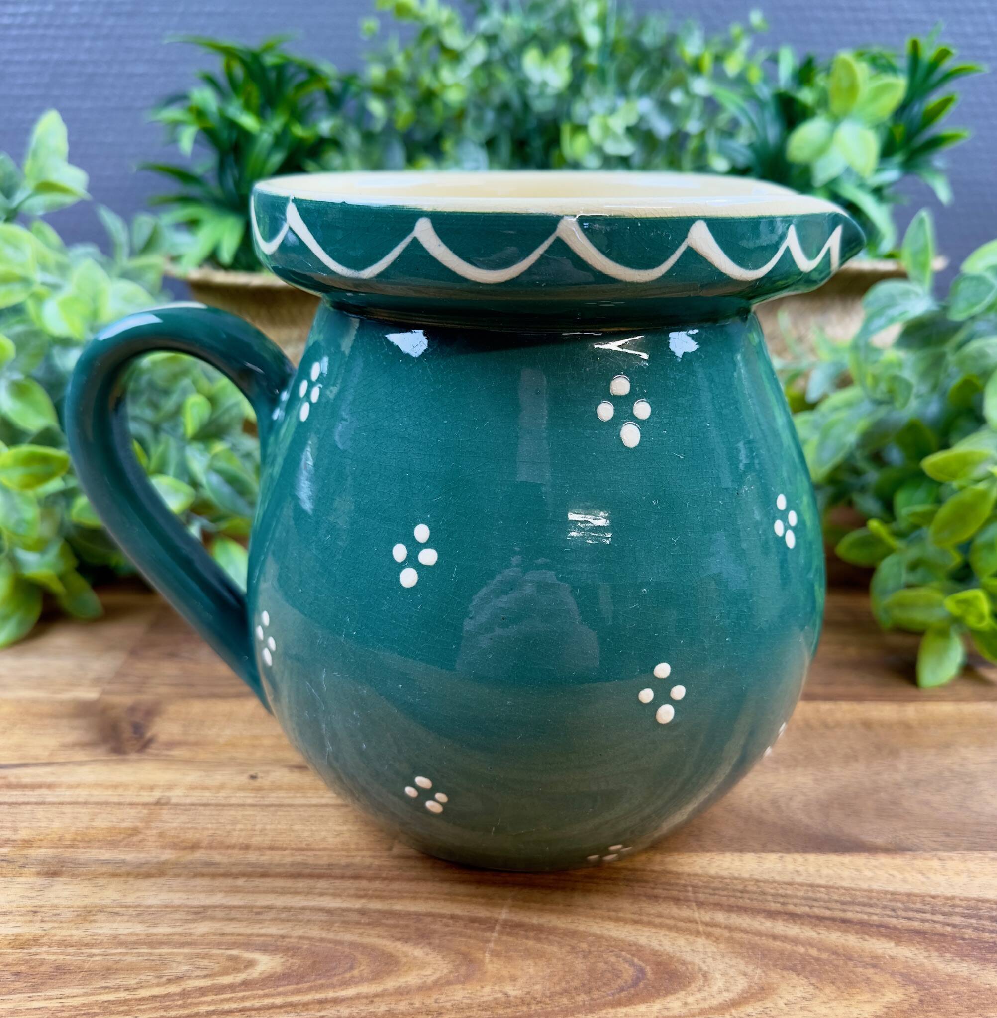 Green glazed ceramic jug