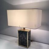 Lamp in gilded metal and stylized glass. In the style of Aldo Tura
