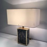 Lamp in gilded metal and stylized glass. In the style of Aldo Tura