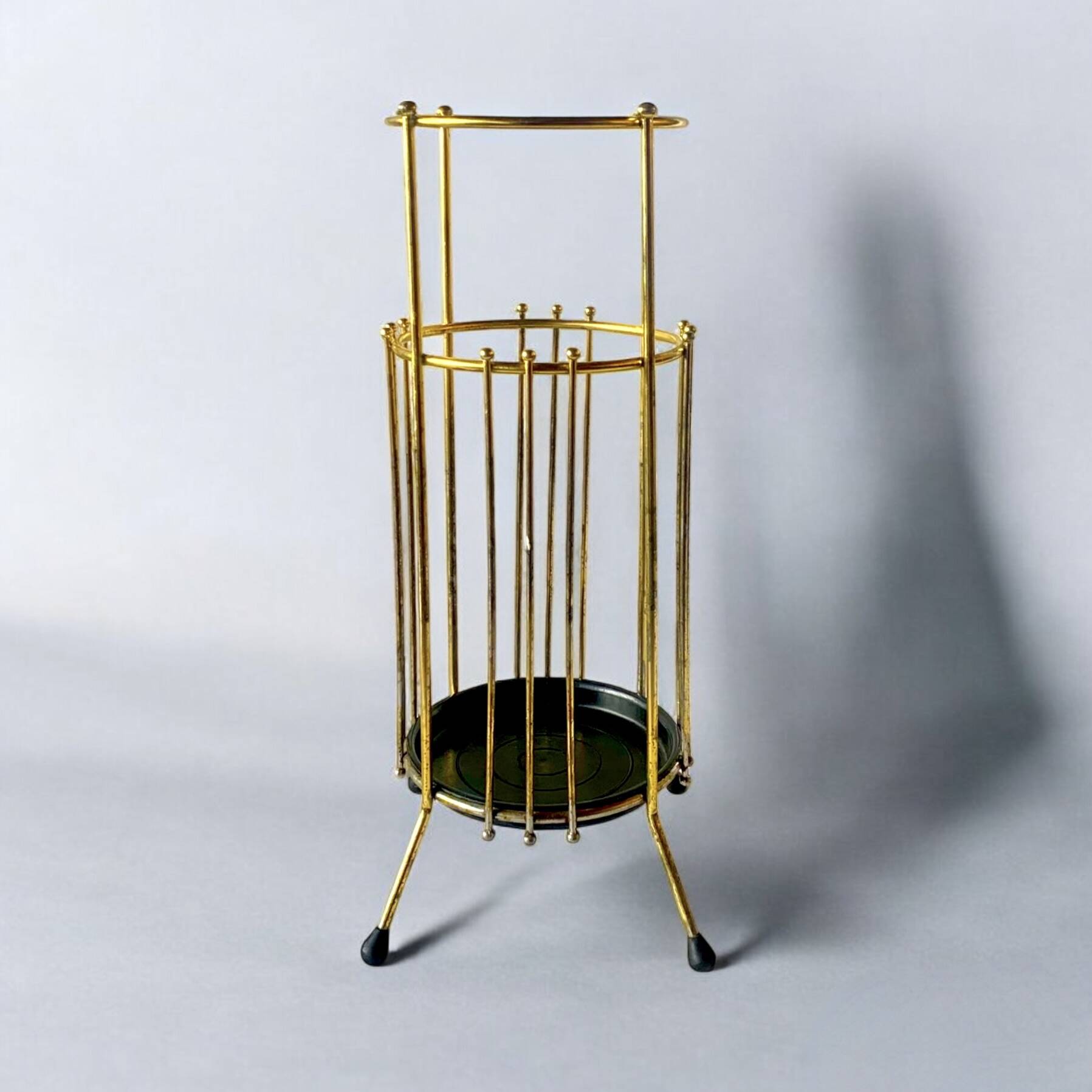 Vintage gold metal umbrella stand