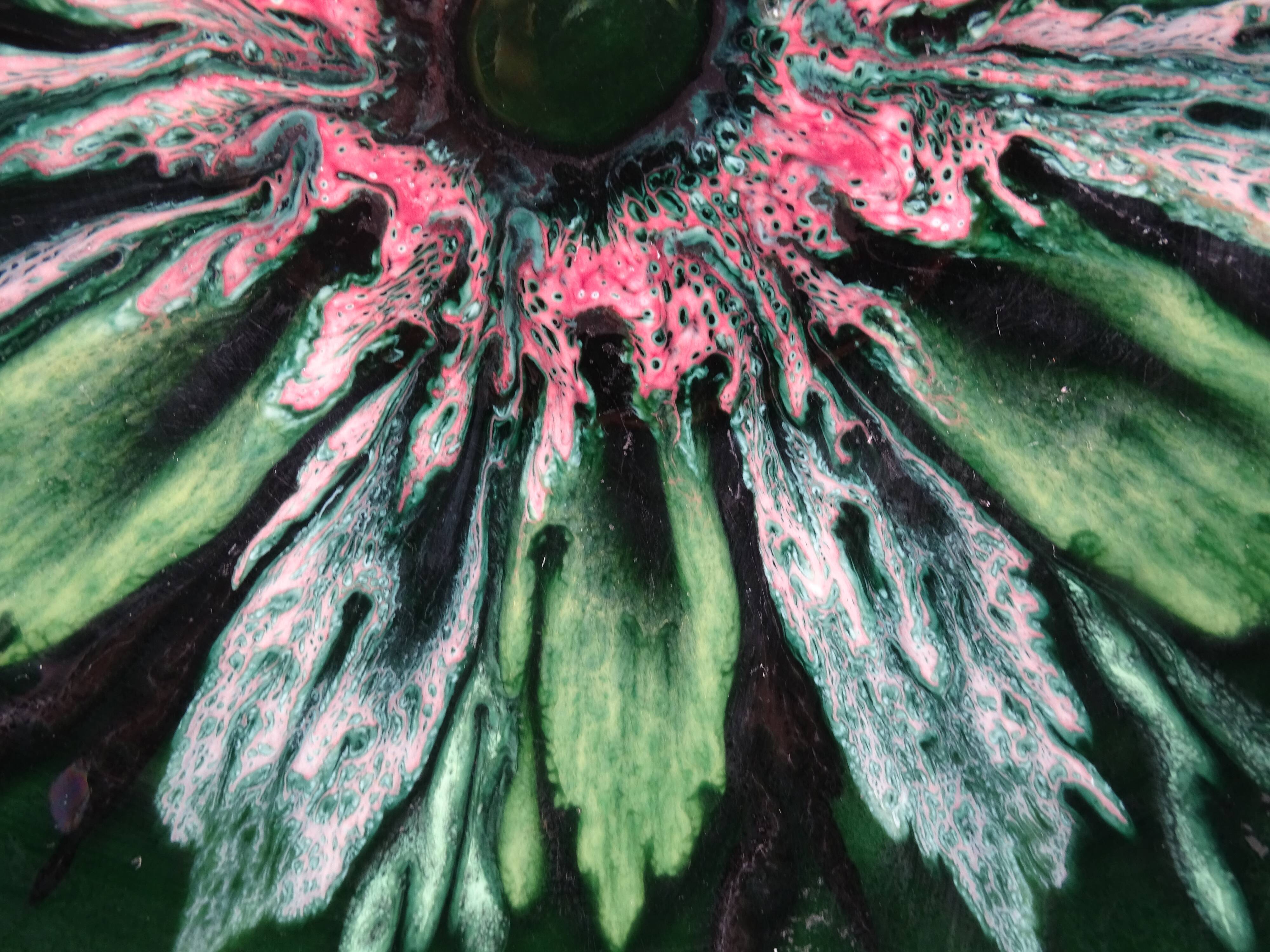 Green faience bowl decorated with multicolored drips around 1970