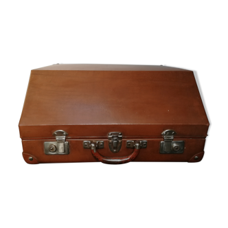 Old suitcase with accordion