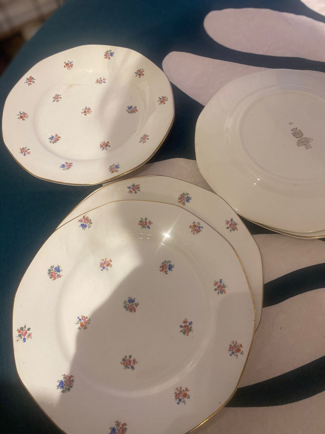 Dessert plate and porcelain dish with a multicoloured floral pattern vintage.