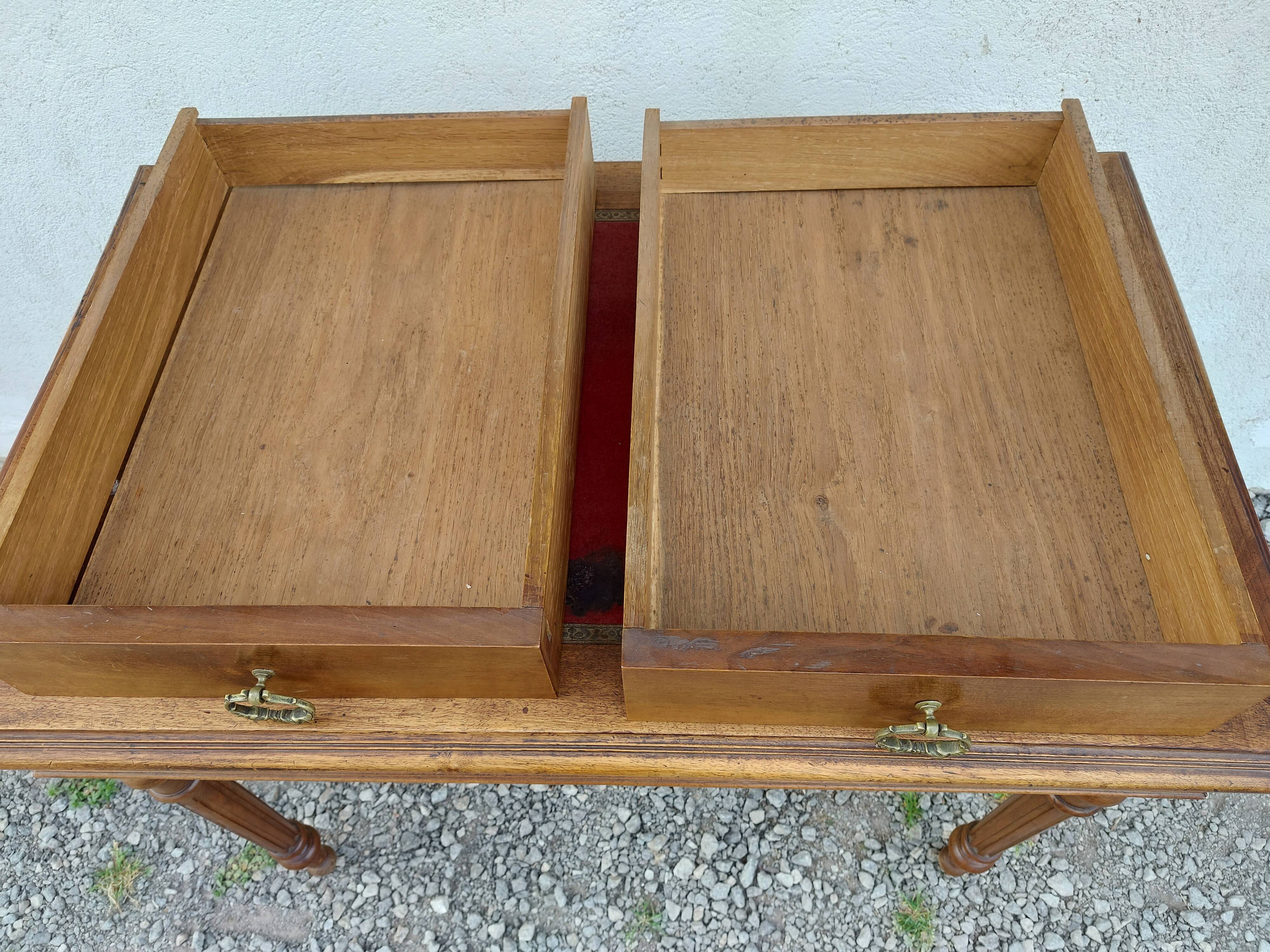 Old wooden desk, red felt top