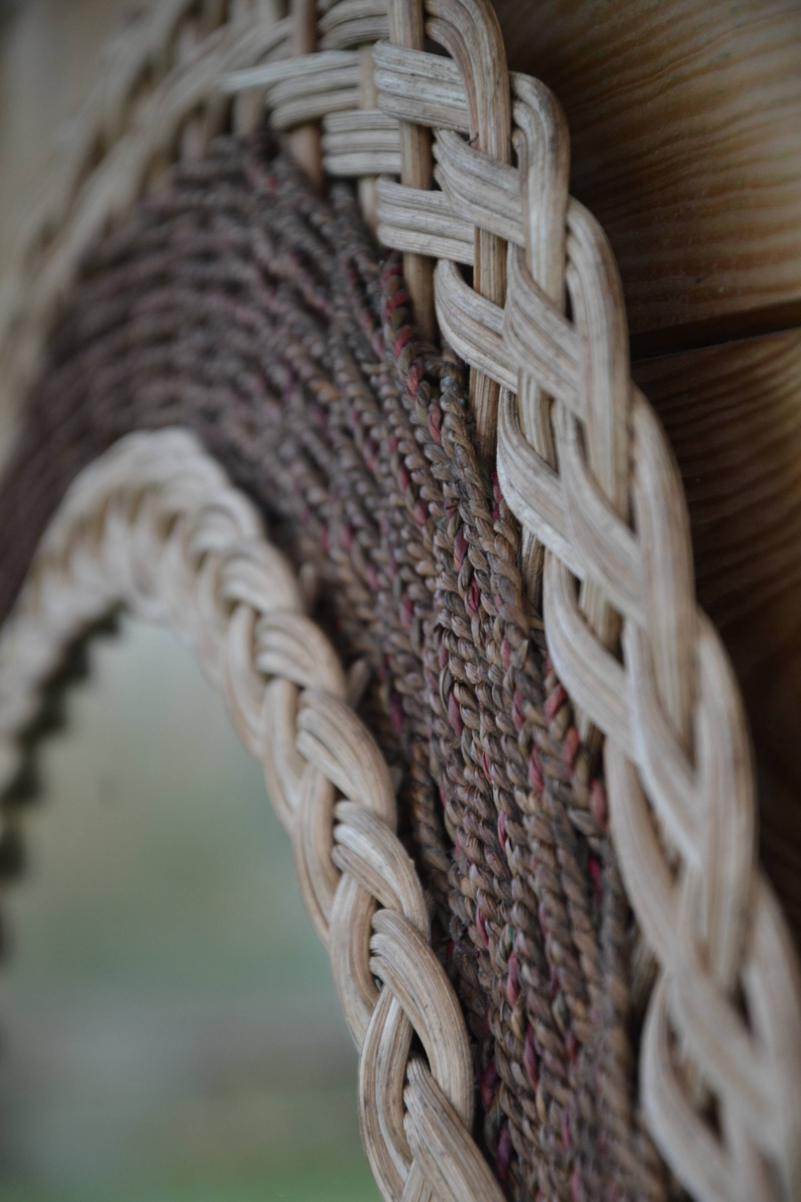 Round woven rattan mirror with rope from the 1970s.