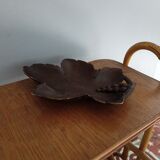 Empty carved wooden pocket black forest style vine pampre