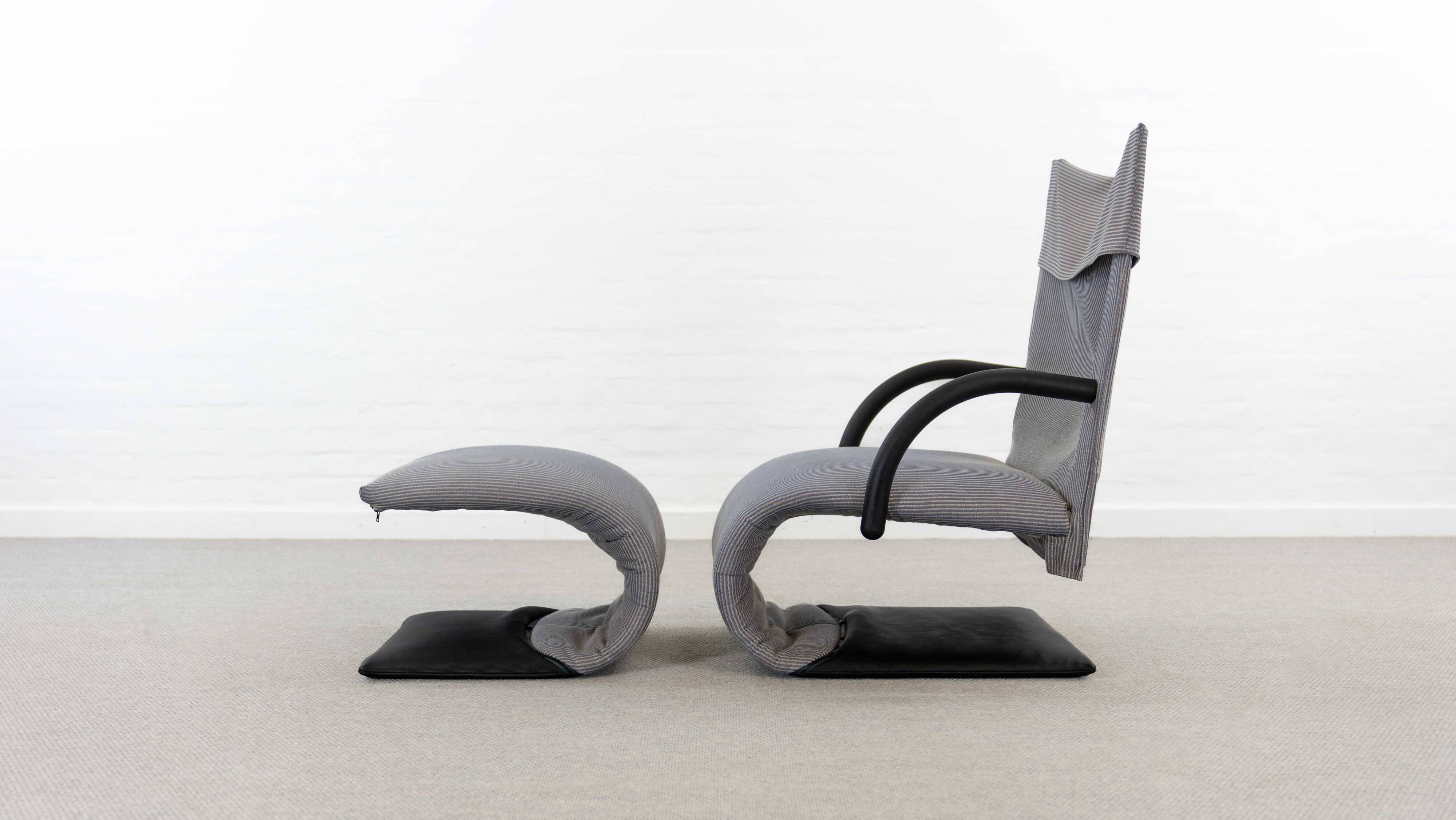 Zen easy chair with footrest by claude brisson for ligne roset