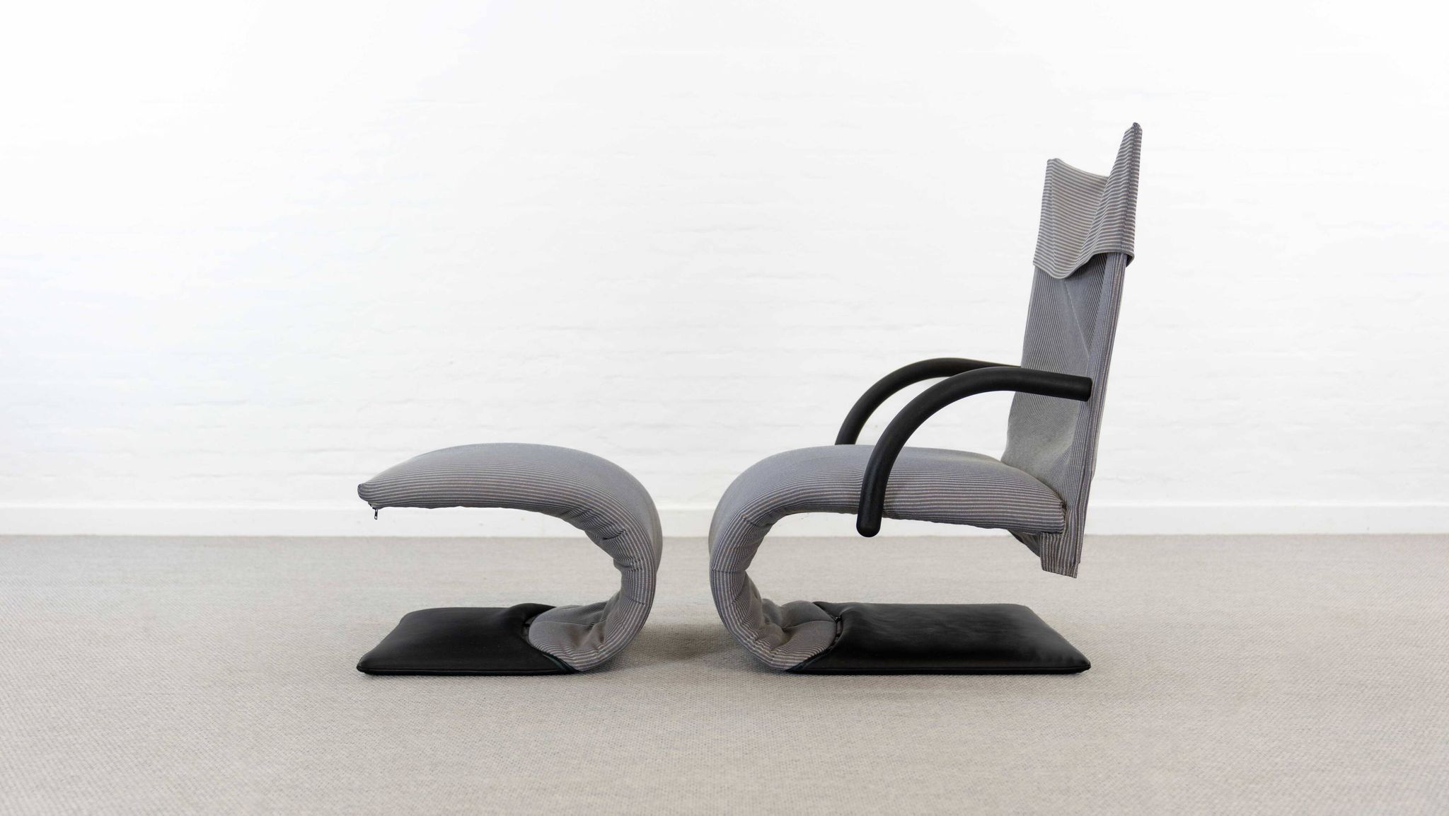 Fauteuil zen avec repose-pieds par claude brisson pour ligne roset