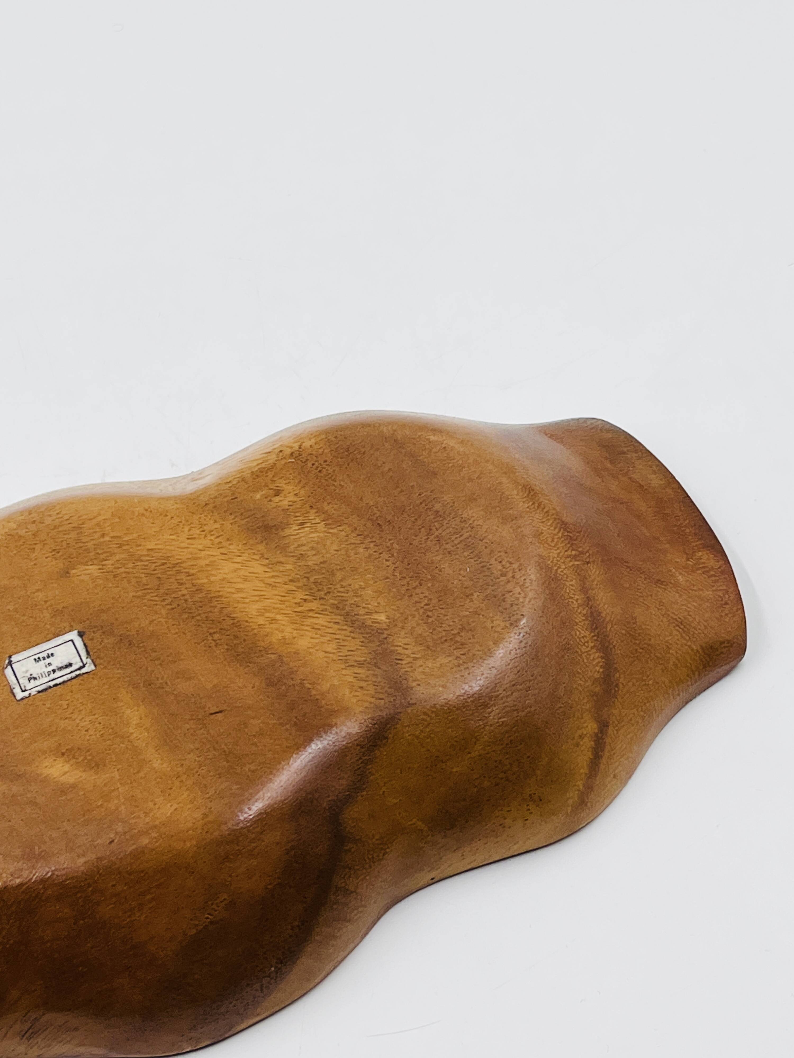 Segmented wooden plateau carved from exotic wood, Asia, 1970s.