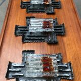 Vintage Italian brutalist wrought iron wall lamp by Albano Poli for Poliarte, set of 4.