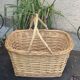 Rattan basket, woven wicker, with two vintage handles