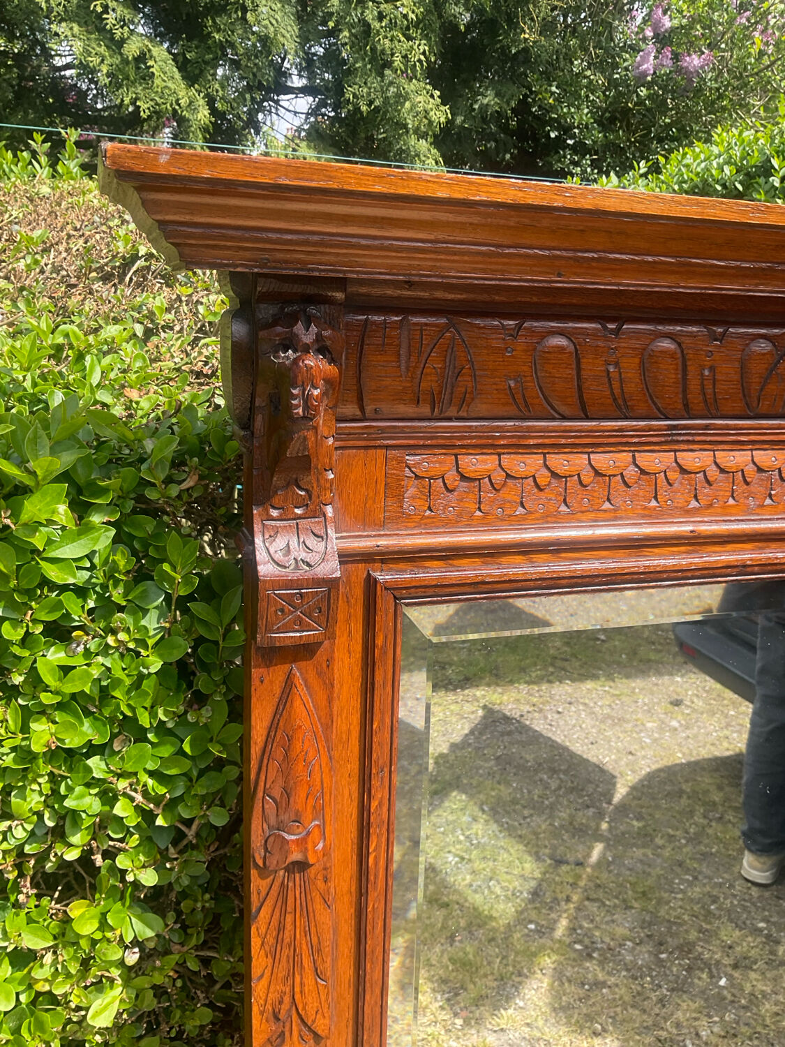 Antique large trumeau mirror in solid wood and bevelled glass.