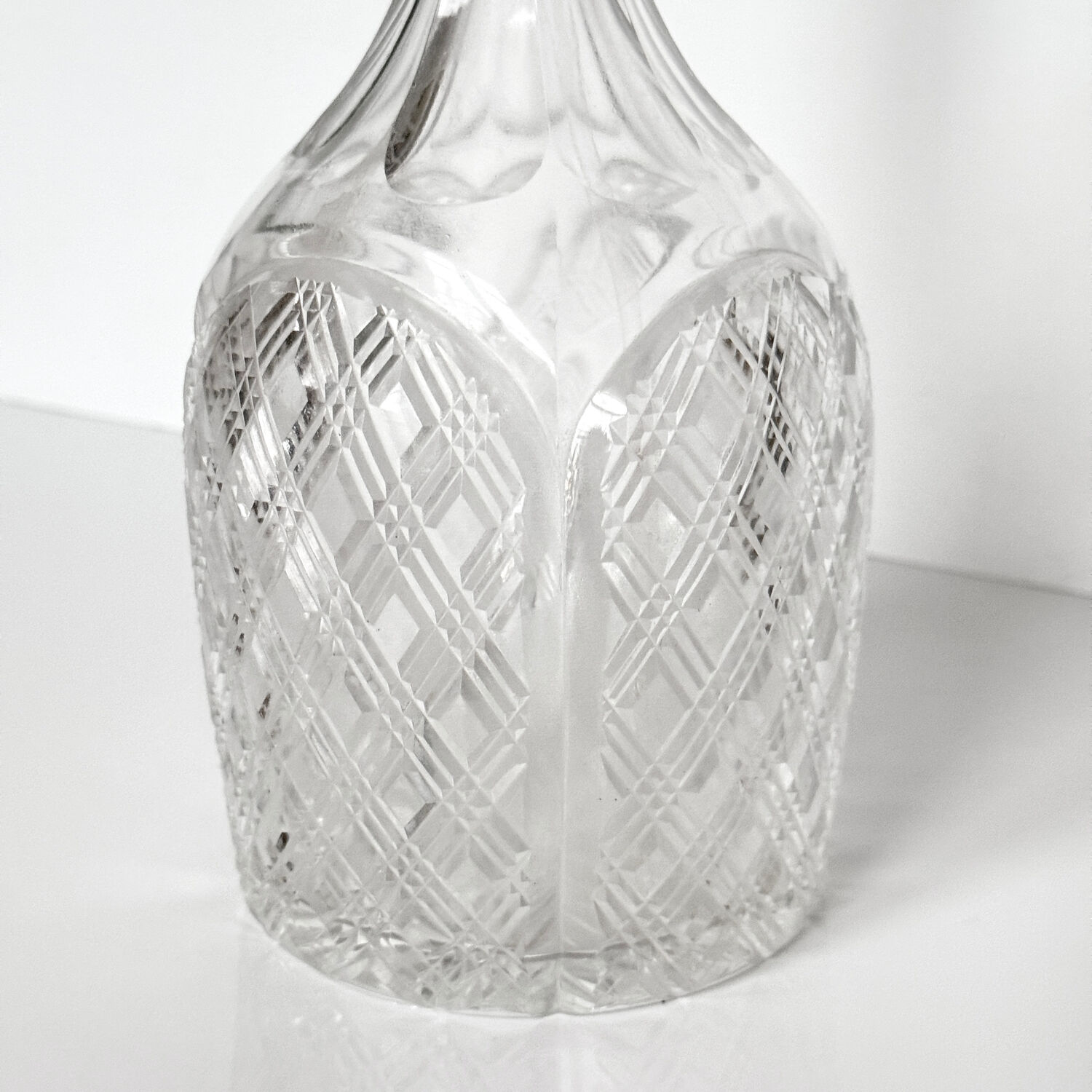 English carafe in crystal and silver