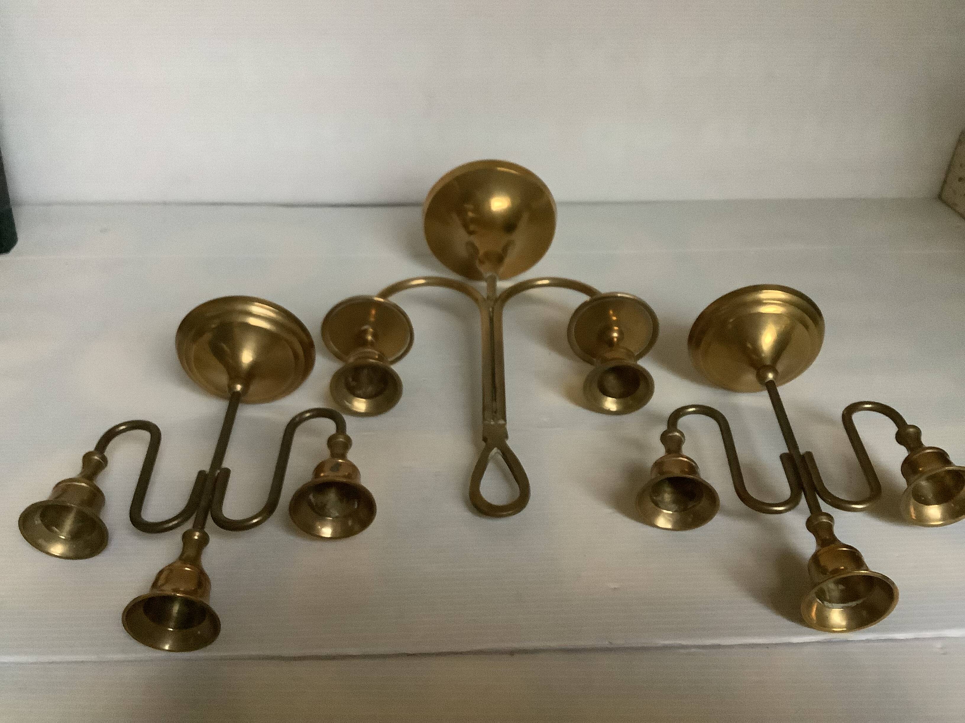 Trio of brass candlesticks with tulip bases