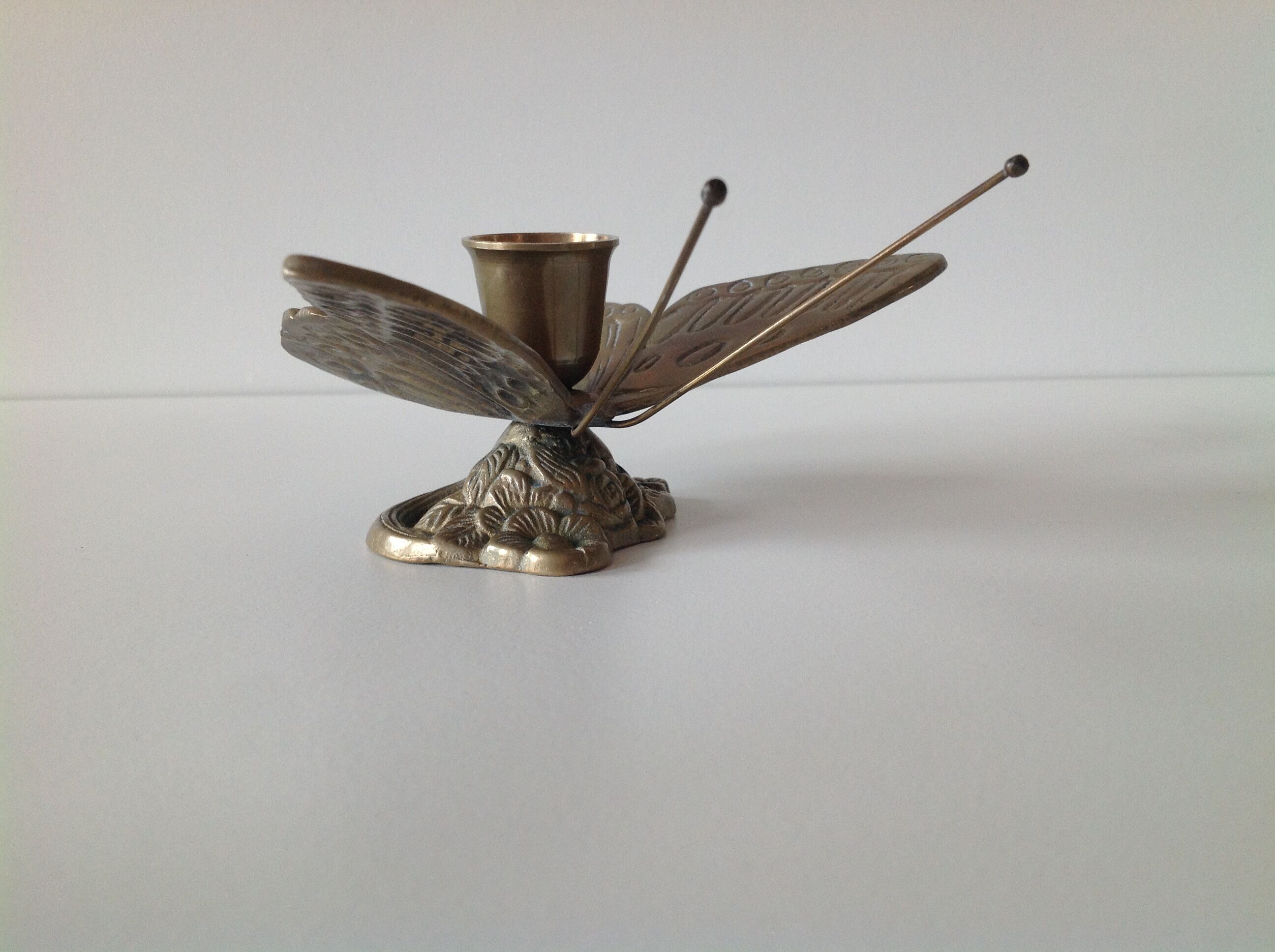 Brass butterfly candlestick