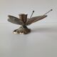 Brass butterfly candlestick