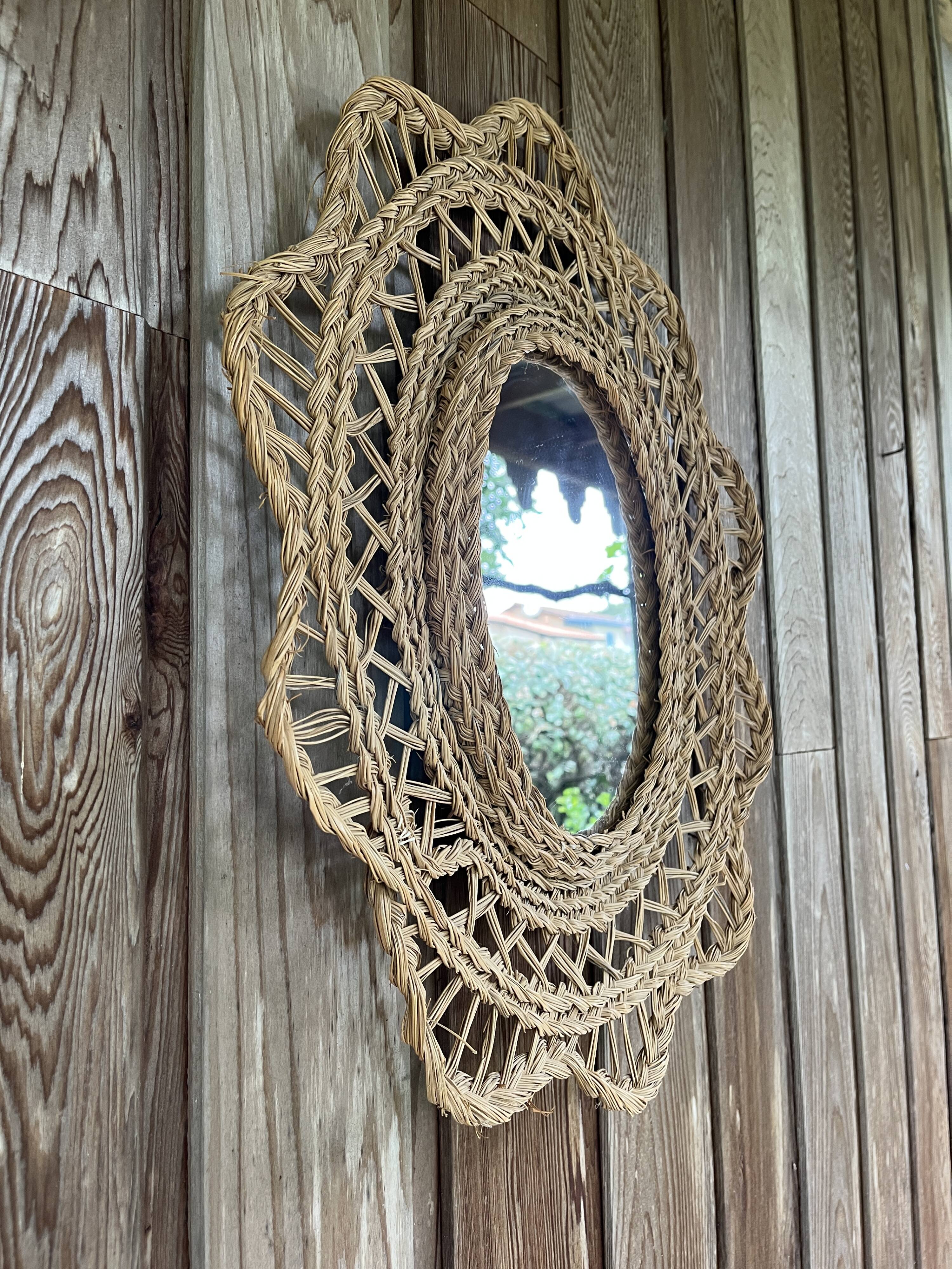 Large braided rattan mirror 1960