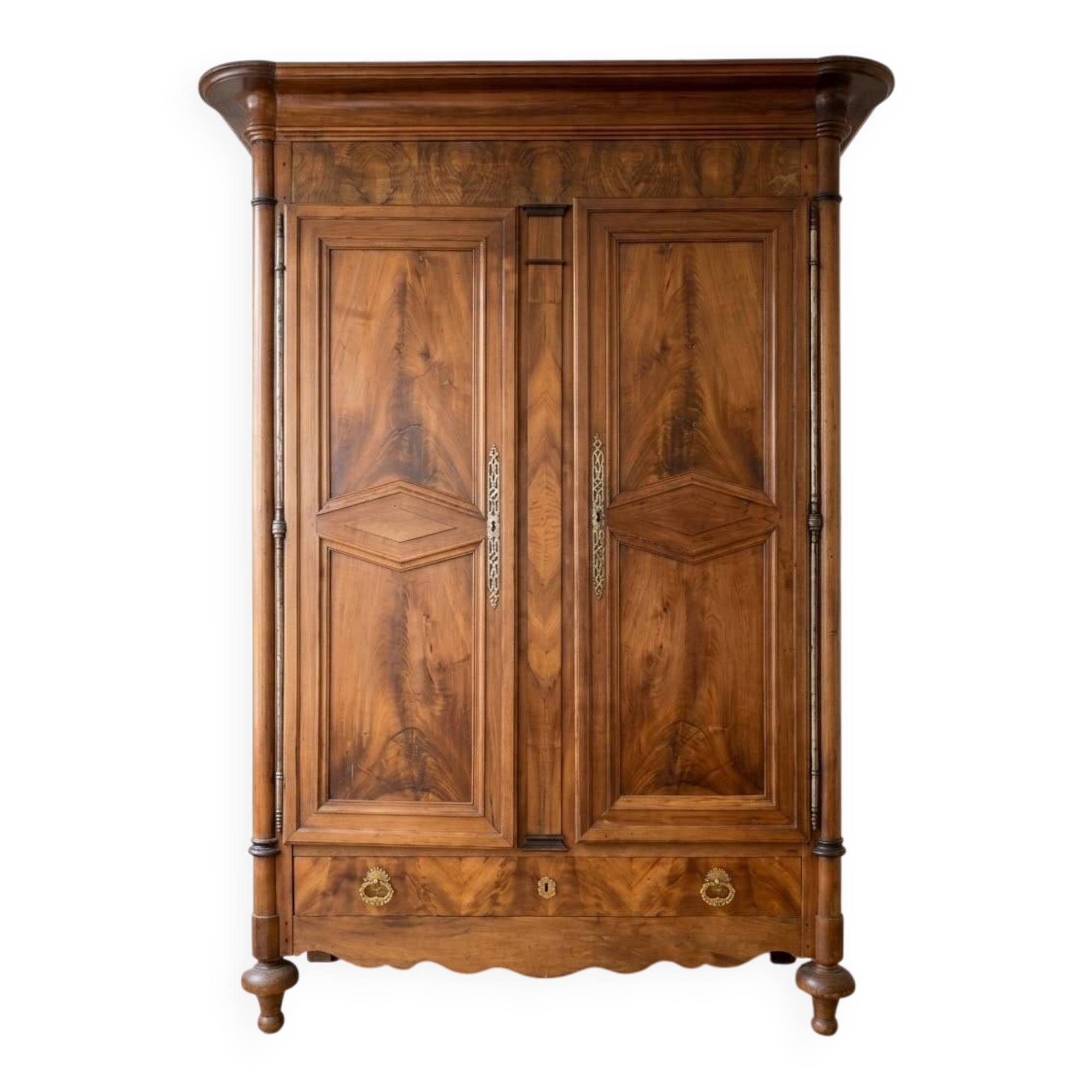 Large antique wooden wardrobe with drawer.