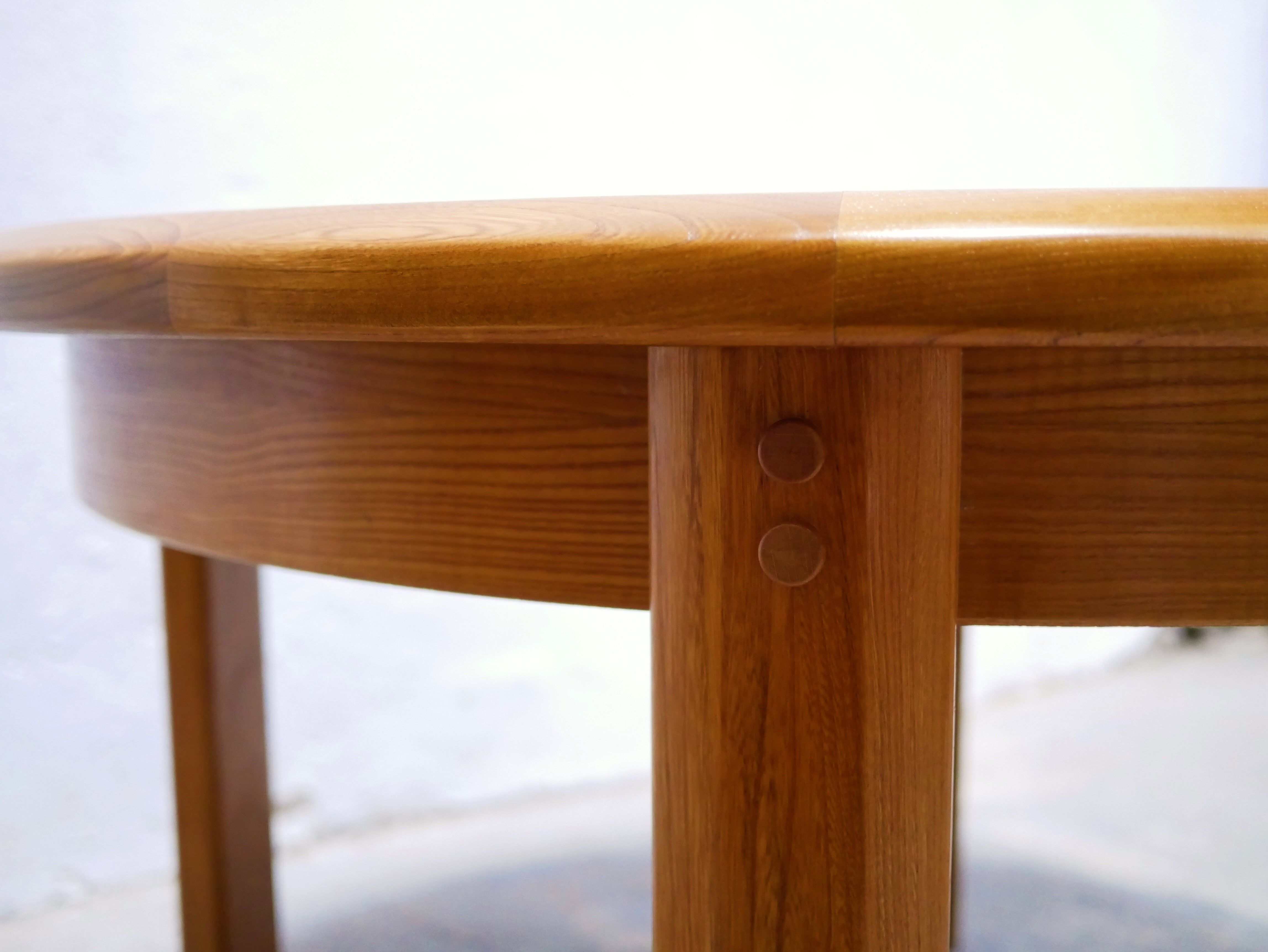 Vintage extendable round wooden dining table