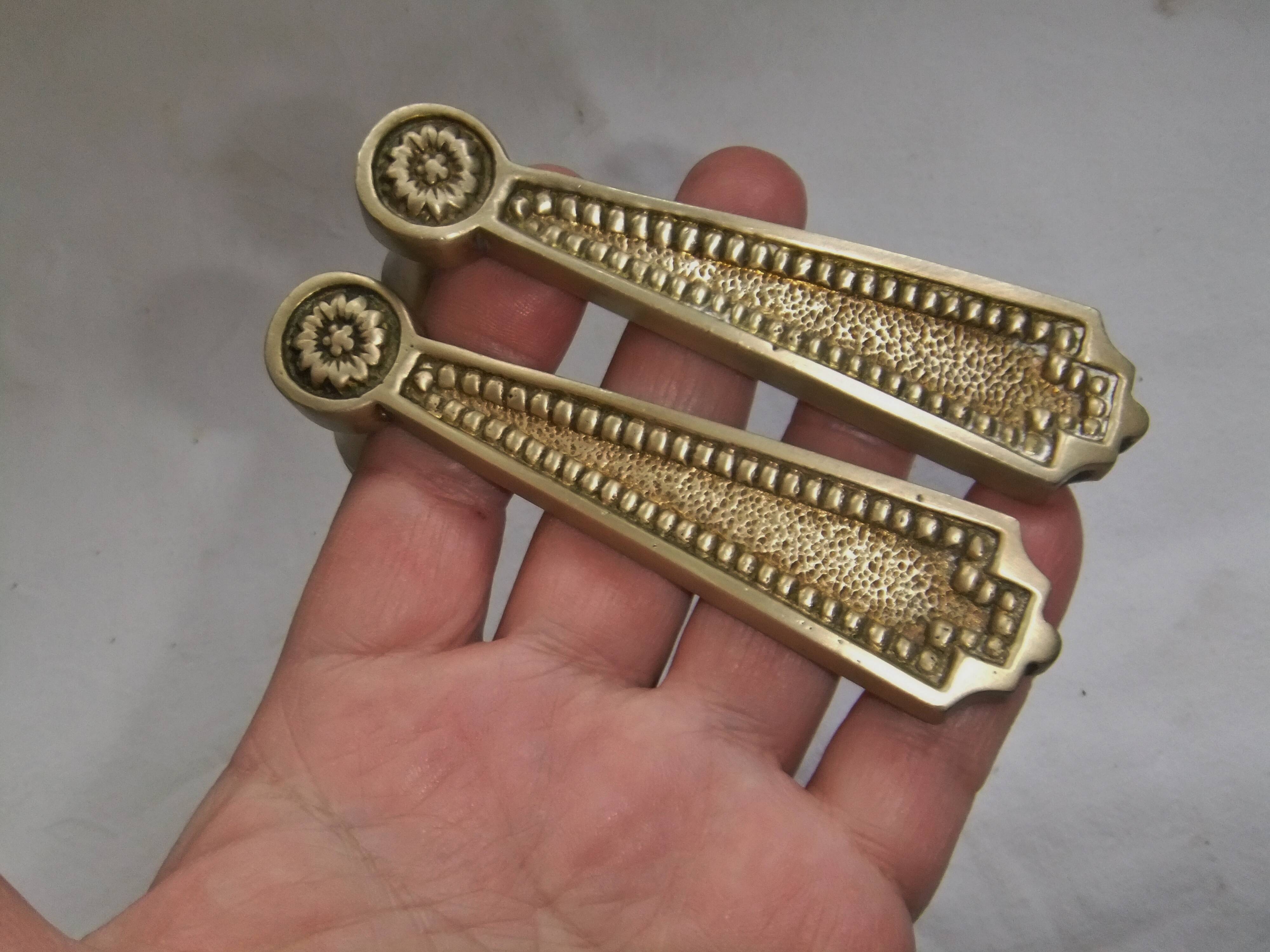 Pair of Louis XVI style beaded bronze door handles