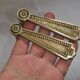 Pair of Louis XVI style beaded bronze door handles