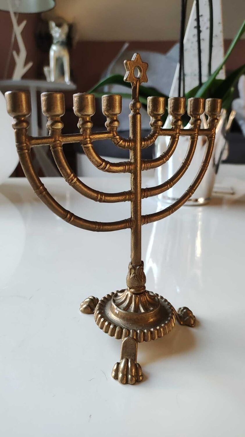 Ancient Menorah of Jerusalem/Jewish Candlestick with 7 tripod branches. Star David. In gilded bronze