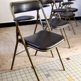 Lot of 4 metal and skai folding chairs