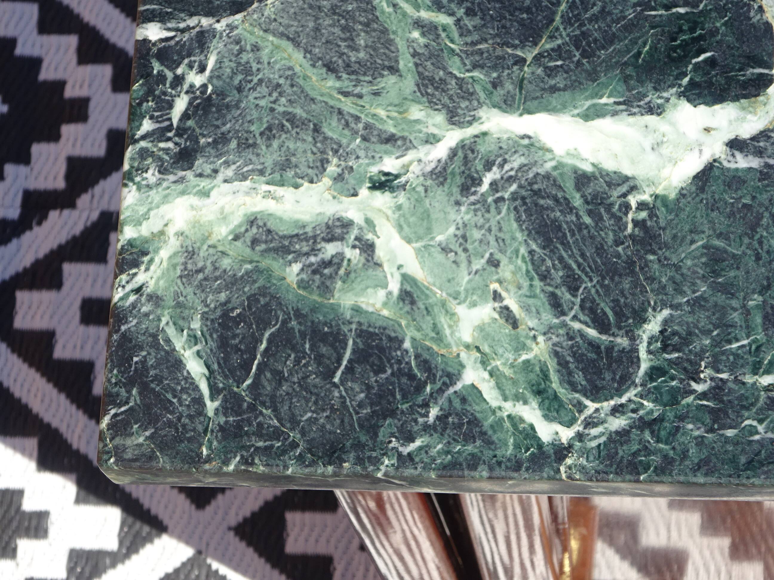 Flamed mahogany enfilade with sea green marble in Empire style.