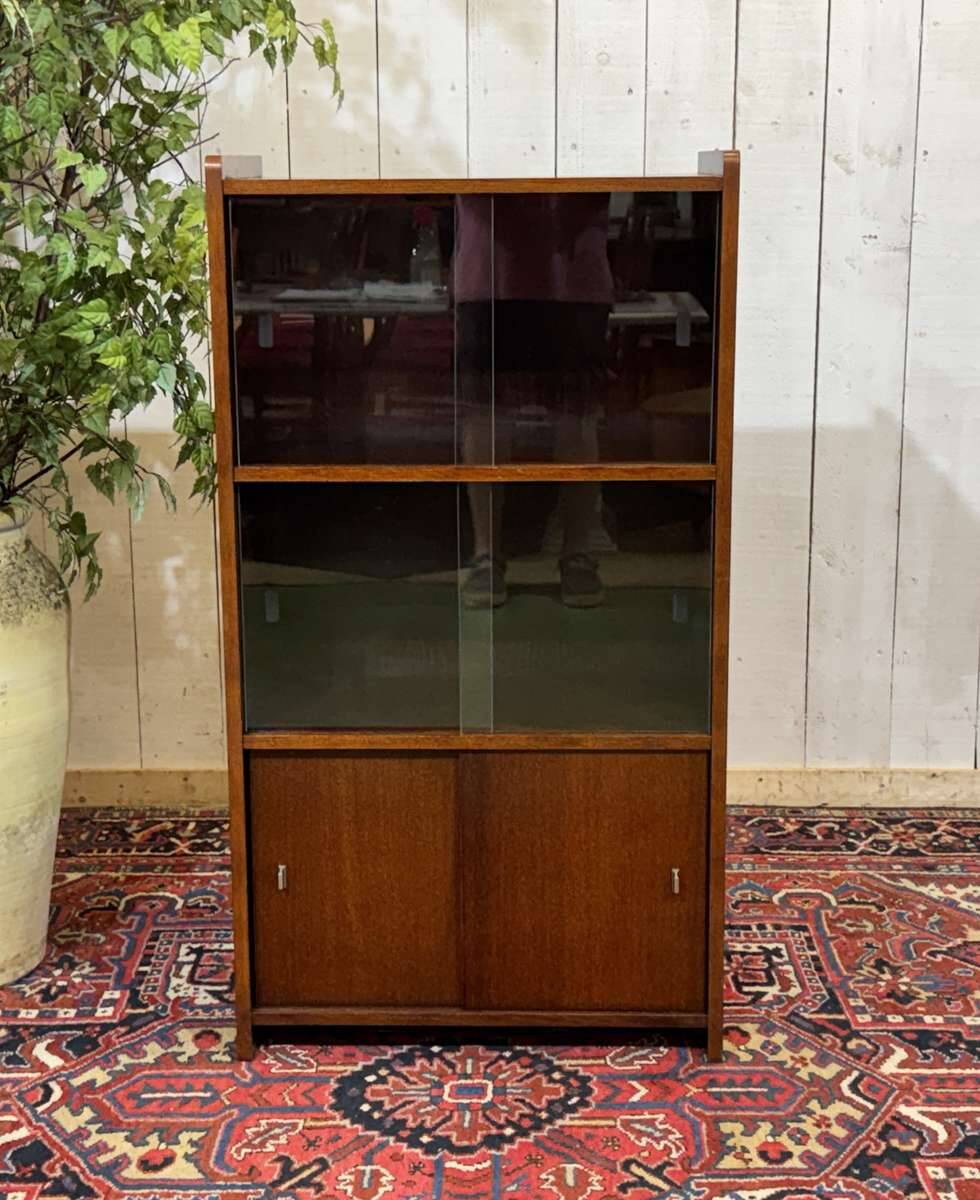 Small English oak library from the 1960s with sliding doors.