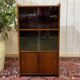 Small English oak library from the 1960s with sliding doors.
