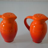 Le Creuset orange advertising salt and pepper