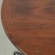 Round antique English tilt-top table/side table from the early 19th century