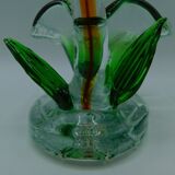 Cup has blown glass jewelry