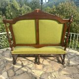 Richly carved solid wood bench in Louis XVI style.