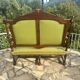 Richly carved solid wood bench in Louis XVI style.