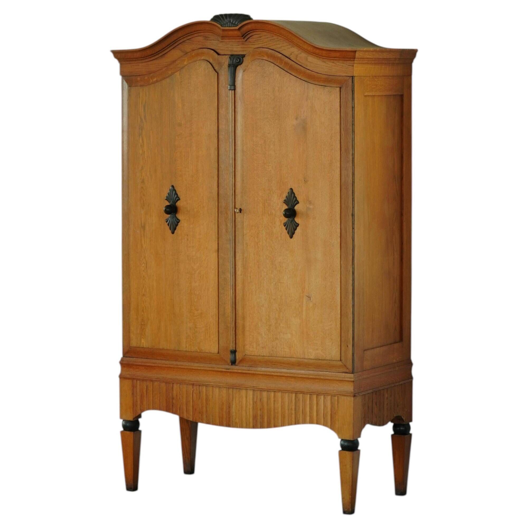 Early 20th century, Art Deco sideboard in Danish oak with hand-carved details, 1930s.