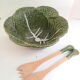 Vintage salad bowl in dabbling cabbage leaf and cutlery