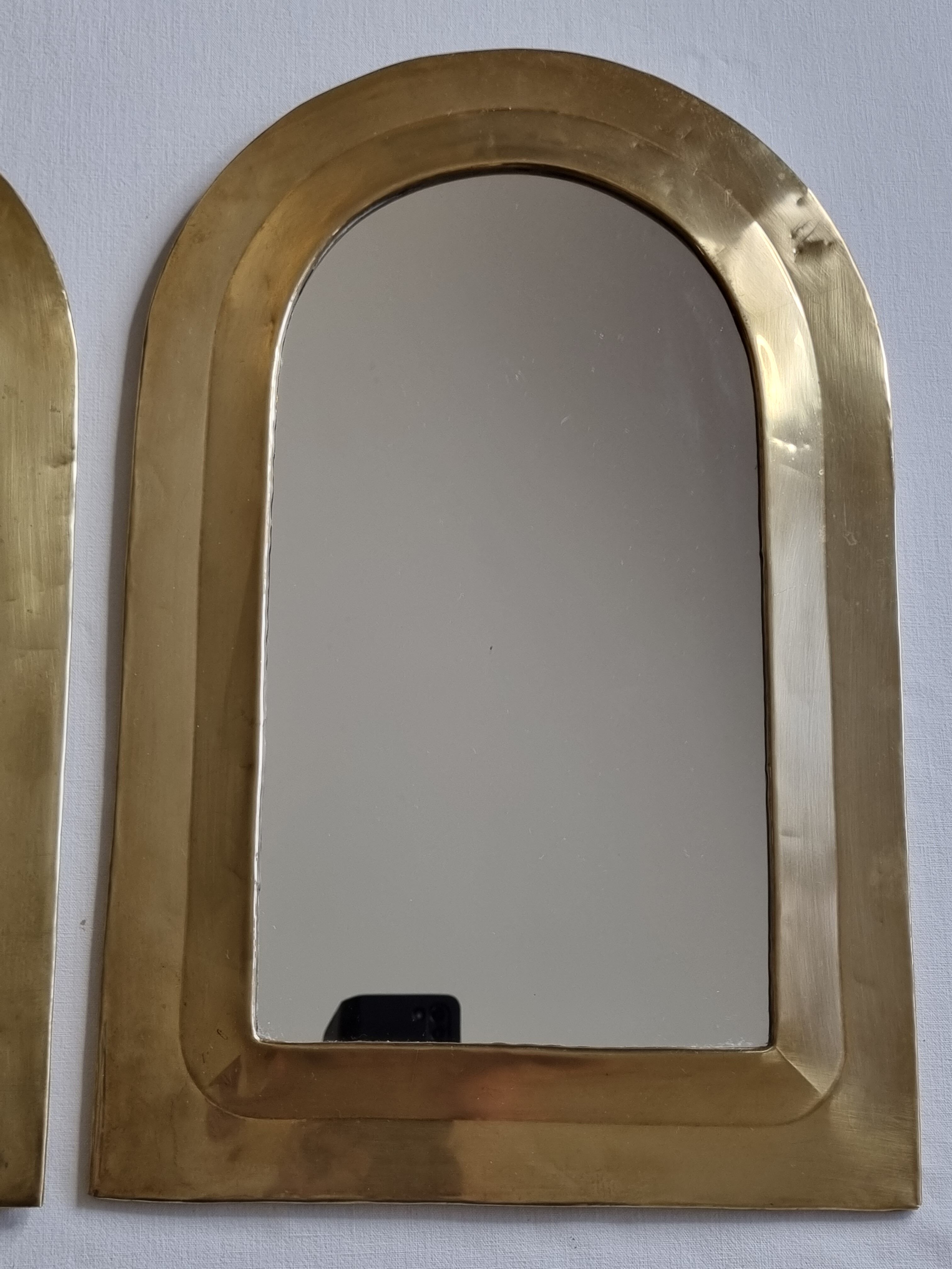 Set of three Moroccan brass mirrors in the form of arches, 43 cm