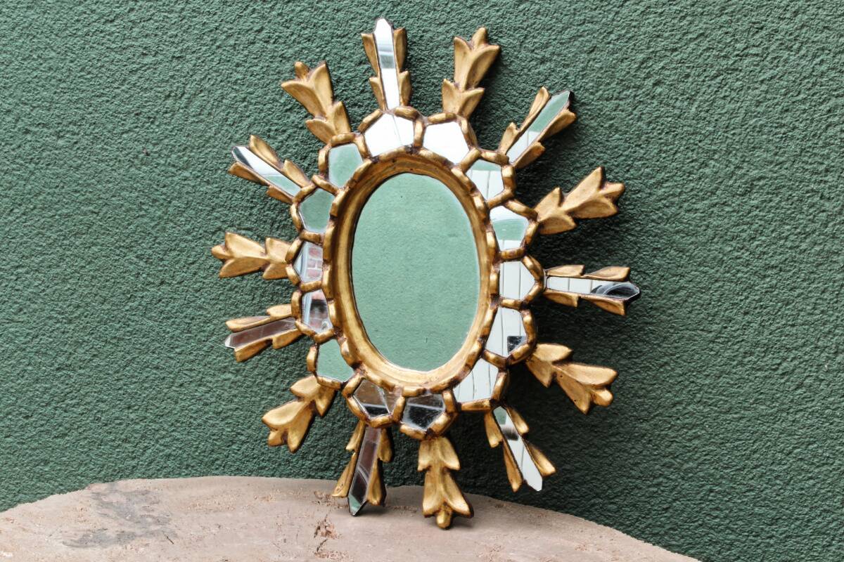 Sun mirror with parecloses, carved wood