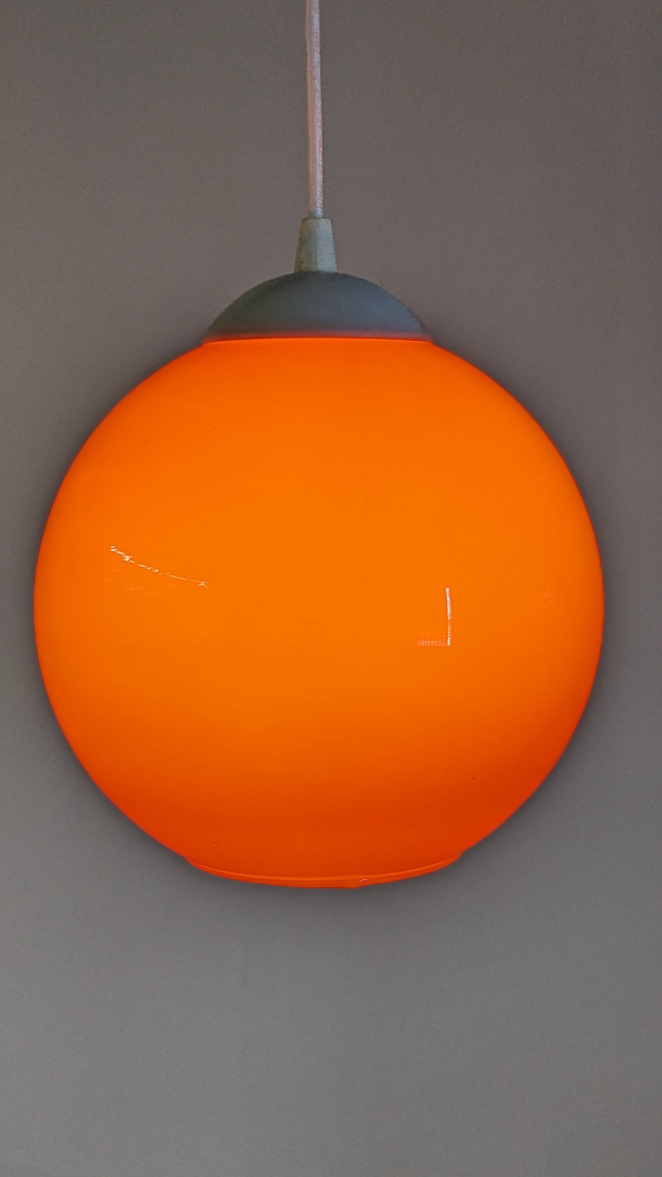 Orange opaline ball pendant, France circa 1970.