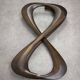 Italian Organic "Snake" Wooden and Smoked Glass Coffee Table, 1960s
