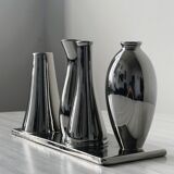 Silver soliflore vases.