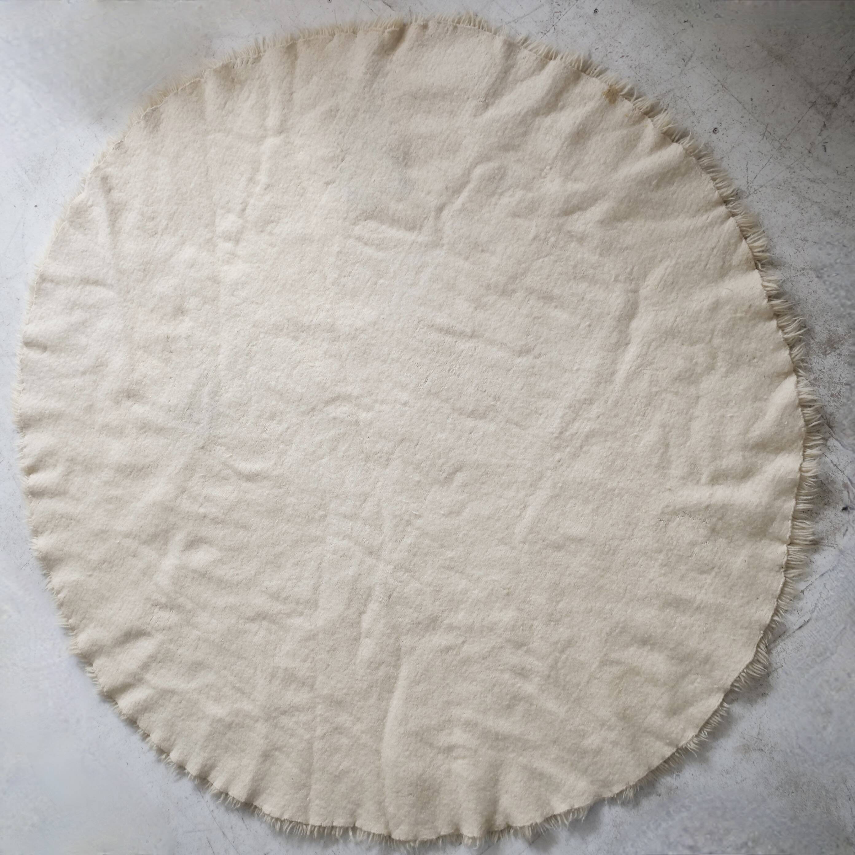 Vintage ecru natural wool round rug