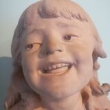 Girl bust signed Bastet in terracotta